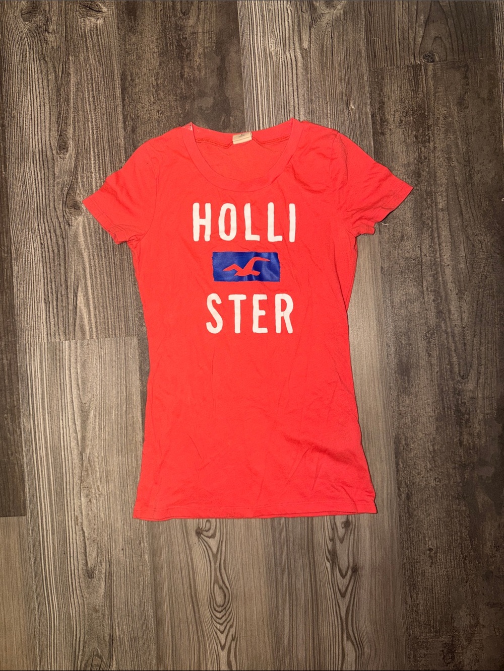 Vintage Hollister Coral Graphic Logo Tee with Blue Emblem
